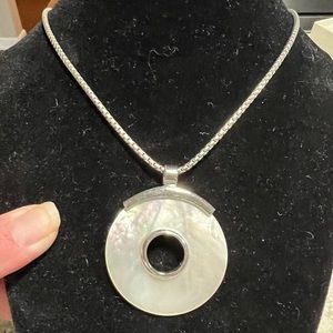 Park Lane mother of pearl colored circular necklace and earrings. 18”